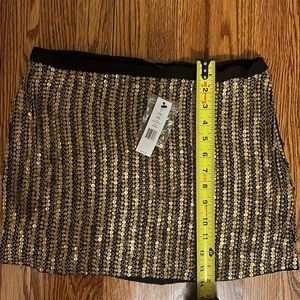 Fully gold sequin mini skirt